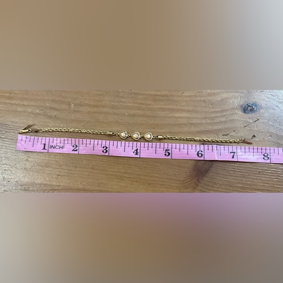 Beverly Hills Gold: 14k.Puffy triple heart rose gold, yellow gold rope bracelet. - Picture 10 of 10